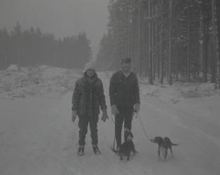 11th January 1965 - Rävtorp.  Ruth, Göran and dogs in forest.