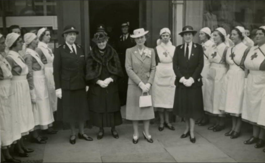 Mary Hope Pollard is second from the right in her Red Cross uniform