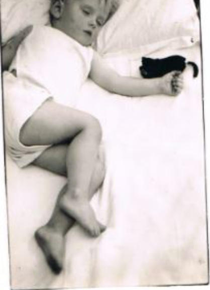 New Delhi  Mid - May 1941  Age 2 yrs 5 months.  He seldom looks as good as this when awake!  (Spotty face due to bad printing only).