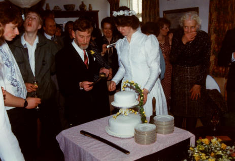 Richard and Terri cutting cake.  Ebenezer House